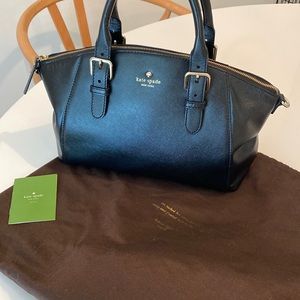Black Kate Spade Purse, lightly used.  Polka dot interior.